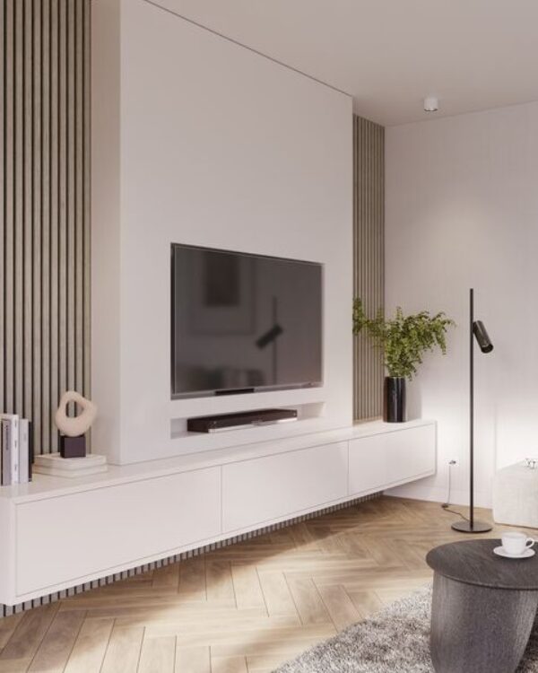 Woonkamer met wit tv meubel op een muur die met wandpanelen is bekleed voor een luxe uitstraling.