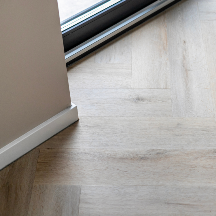 Close-up van pvc visgraat vloer