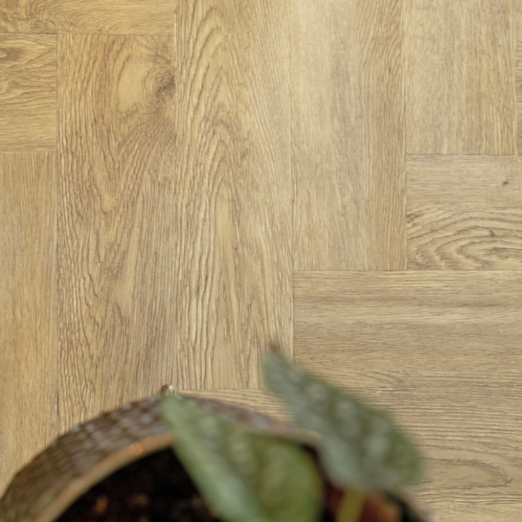 Close-up van pvc-vloer in visgraat