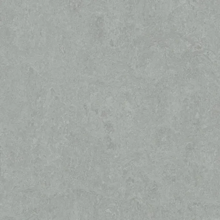 Close-up van Marmoleum Fresco Cinder, lichtgrijze vloer met zachte marmering