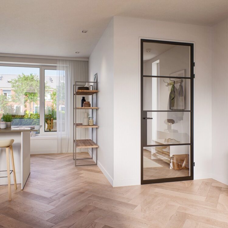 Situatie na de make-over: woonkamer met zwarte stalen deur voor extra daglicht in plaats van houten opdekdeur.